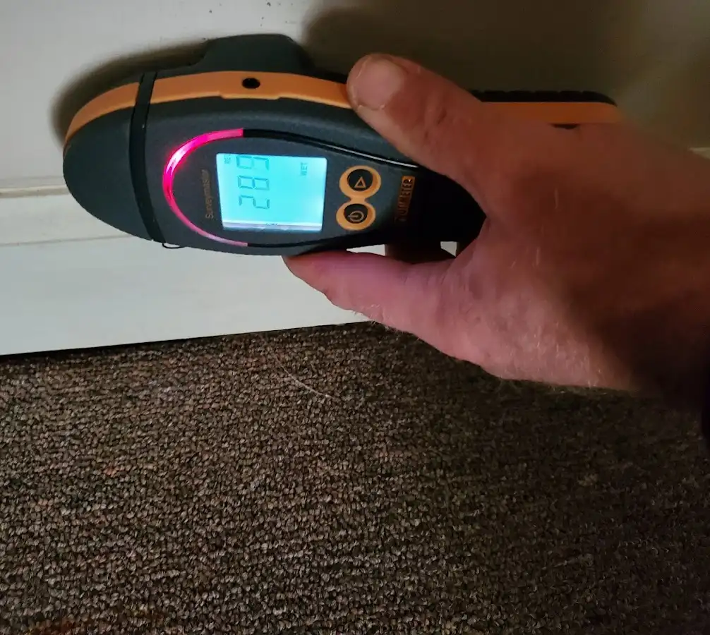 Moisture detection at baseboard during Burst Pipe Cleanup in Bellefonte